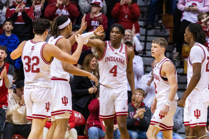 Indiana Hoosiers forward Anthony Walker (4) celebrates a basket and foul with teammates in the second half against the Morehead State Eagles at Simon Skjodt Assembly Hall.